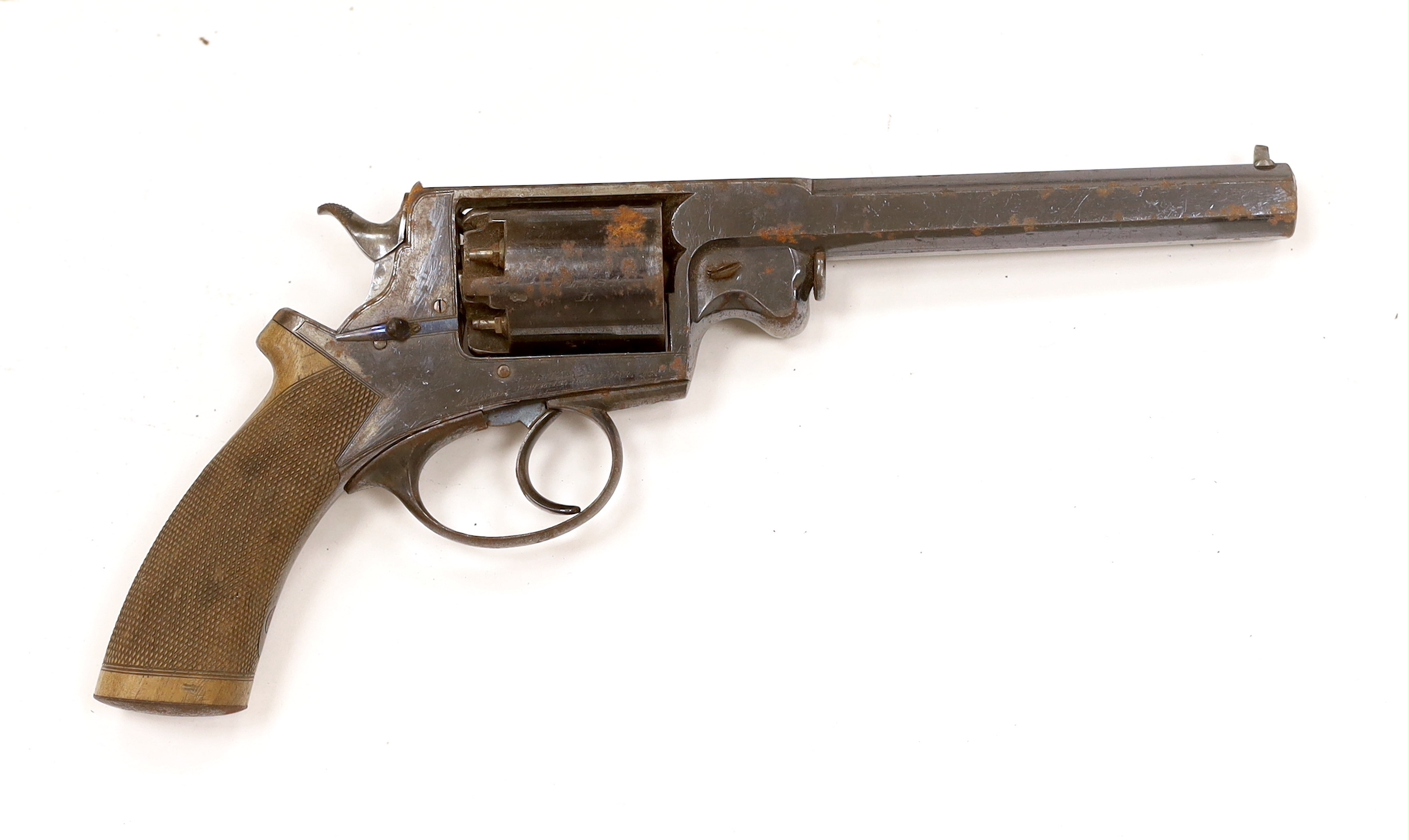 A five shot 38 bore Beaumont Adams patent double action percussion Dragoon pistol, retaining much of its original blued finish, top strap engraved Robert Adams 76 King William Street London